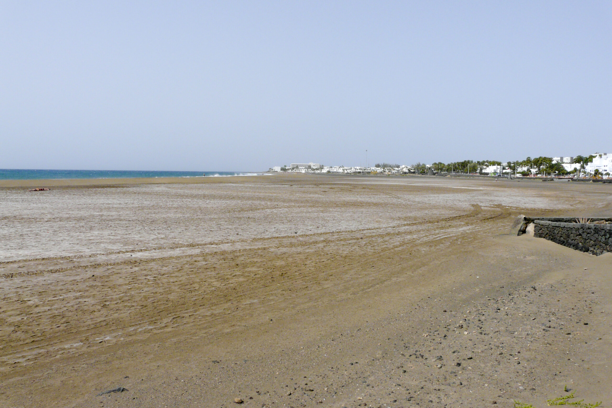 Puerto del Carmen Lanzarote beach resort with golden sandy beaches and calm Atlantic Ocean