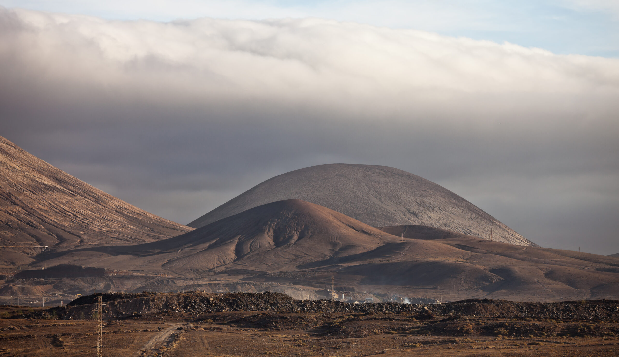 Scenic view over Puerto del Carmen resort, Lanzarote, showing the coastline